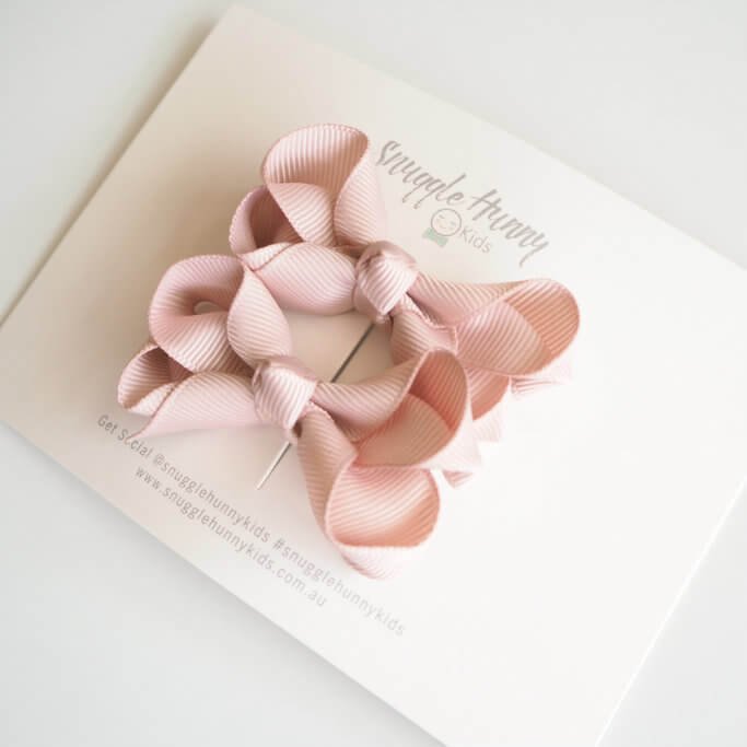 nude-clip-bow-small-piggy-tail-pair-image